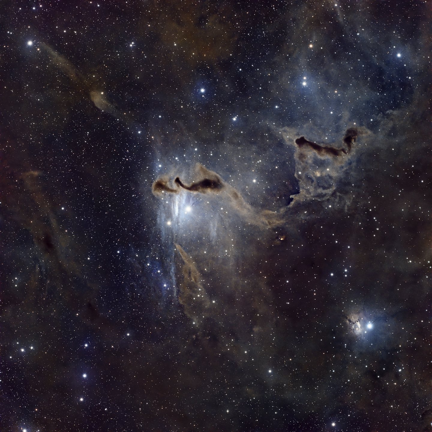 Clouds of cosmic dust and nebulae in deep space.